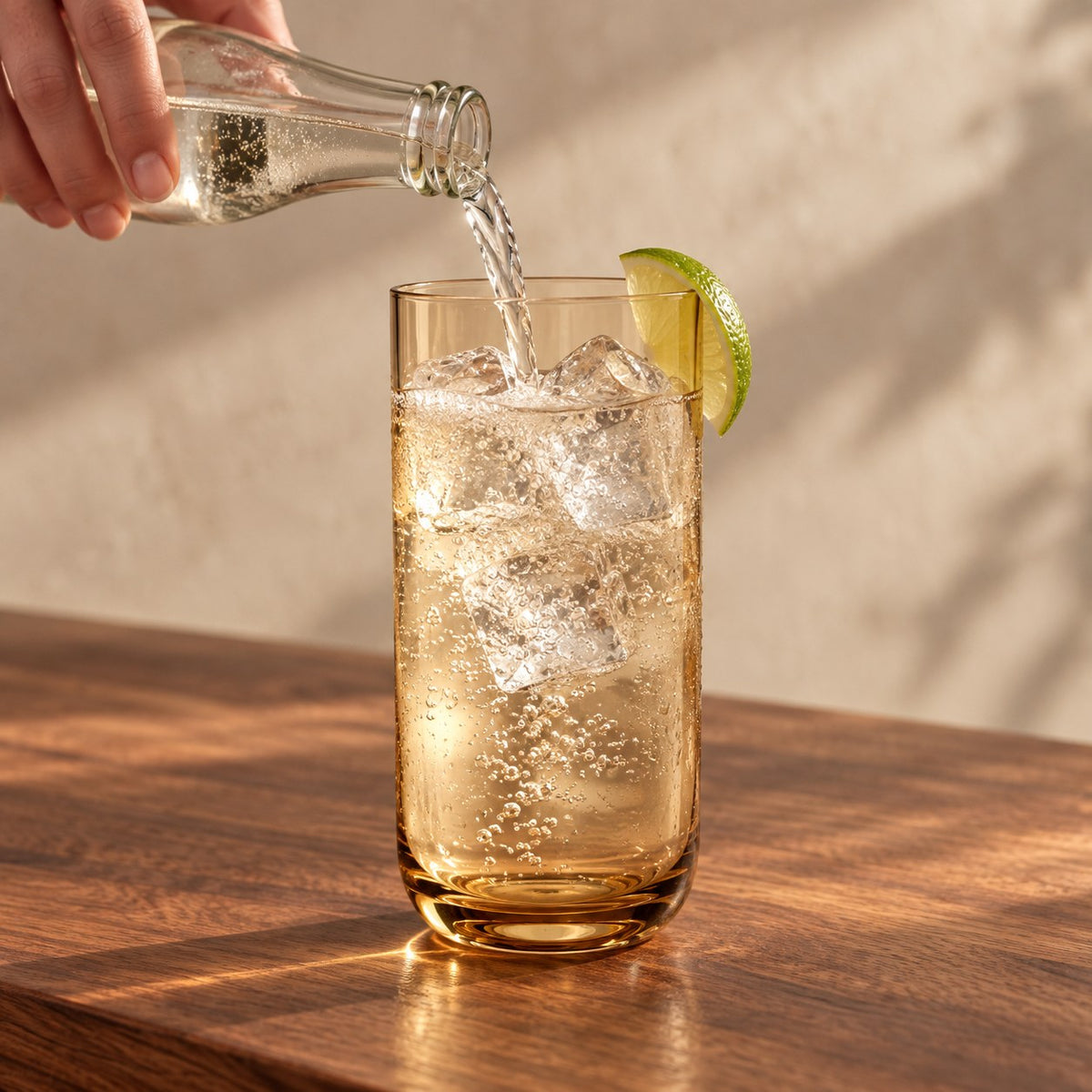 Marver Alabaster and Ochre highball glasses with tonic poured into a gin and tonic