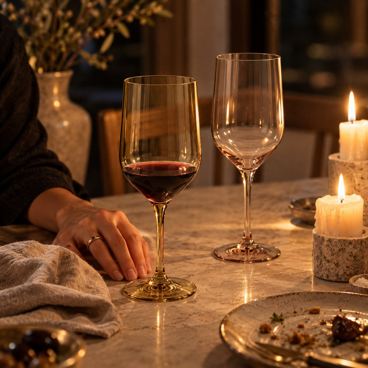 Marver Alabaster and Ochre wine glasses late at night after dinner